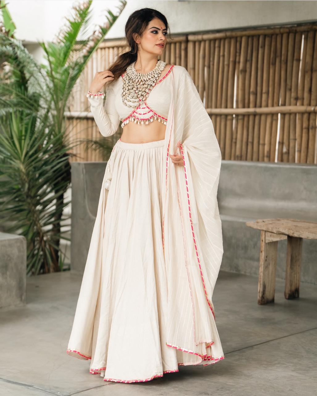 Lvory Grace: Ethereal Chaniya Choli with Subtle Pinkย Highlights