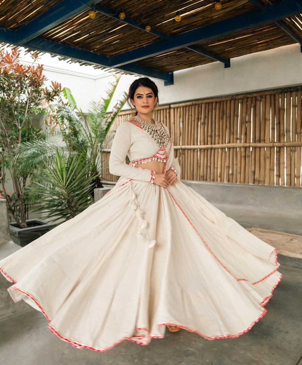 Lvory Grace: Ethereal Chaniya Choli with Subtle Pinkย Highlights