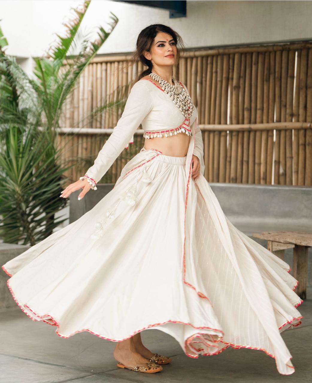 Lvory Grace: Ethereal Chaniya Choli with Subtle Pinkย Highlights